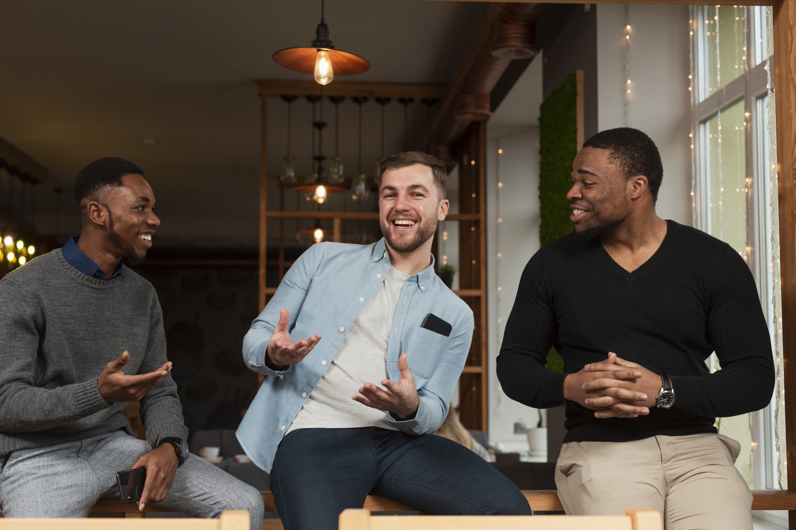 low-angle-men-having-good-time